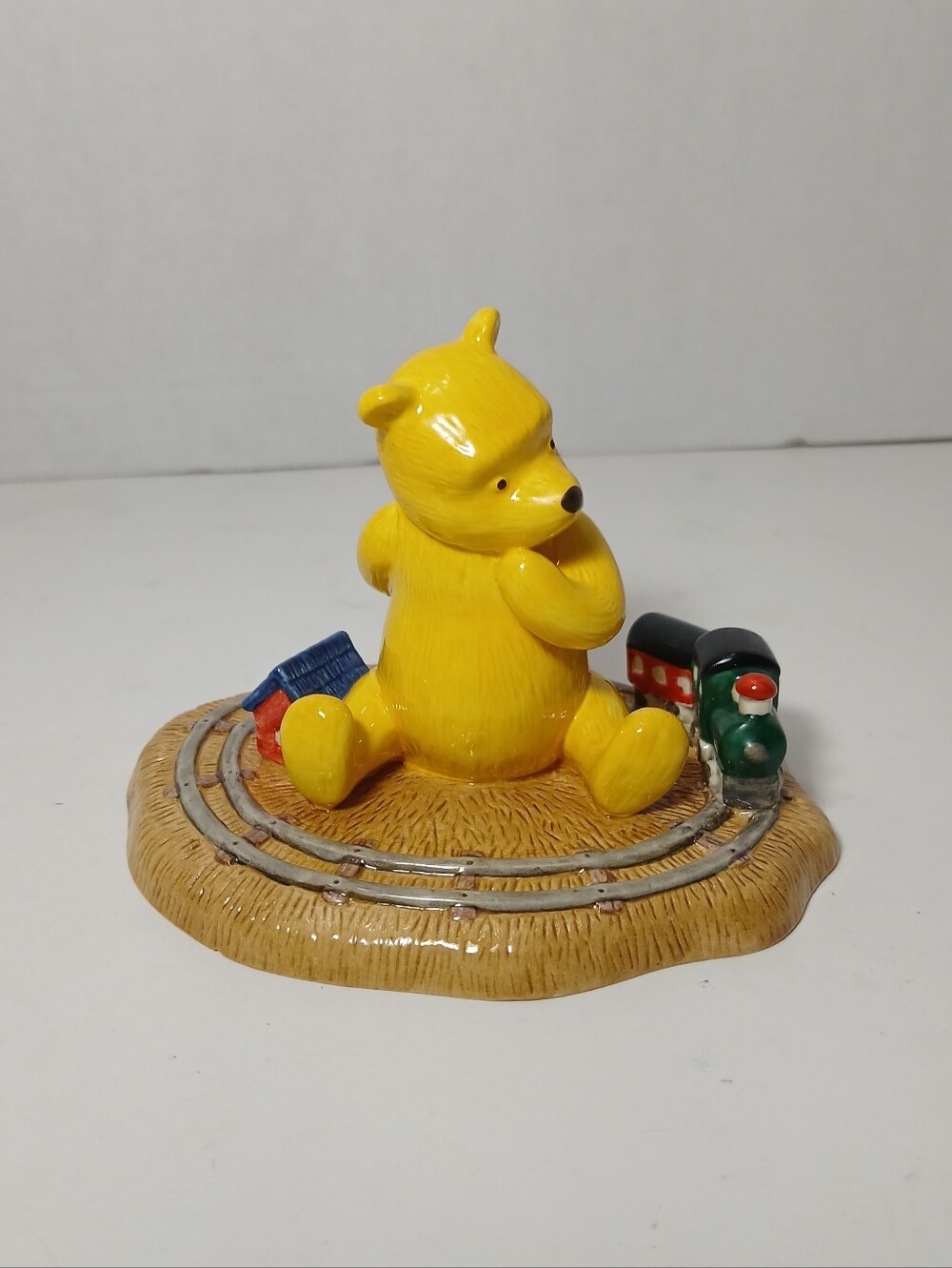 Royal Doulton Yellow Bear Toy Figurine with Blue and Green Accents
